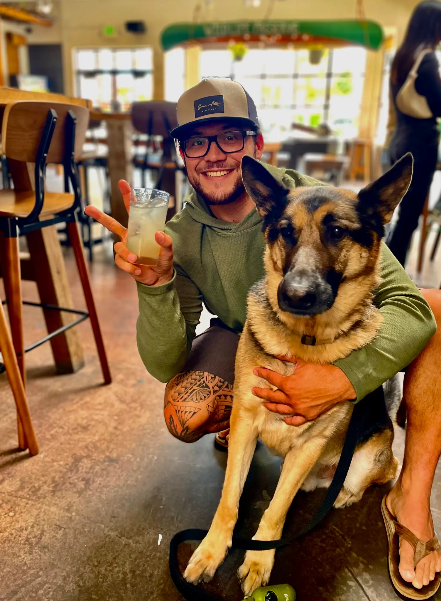 Friendly staff and a dog at Unbearable Skee Lodge happy hour